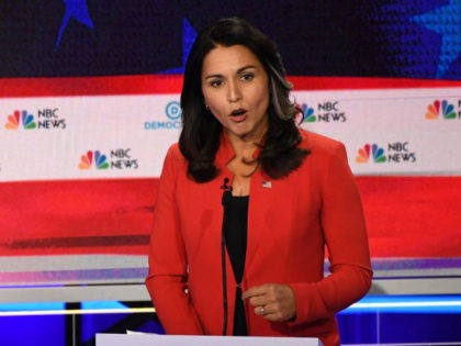 MIAMI, FLORIDA - JUNE 26: Rep. Tulsi Gabbard (D-HI) speaks during the first night of the Democratic presidential debate on June 26, 2019 in Miami, Florida. A field of 20 Democratic presidential candidates was split into two groups of 10 for the first debate of the 2020 election, taking place …