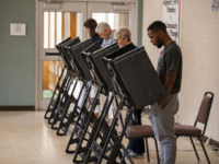 Christian Cantrell, an 18 year old casts his vote for the first time in Charlotte, North Carolina on November 6, 2018. - Americans started voting Tuesday in critical midterm elections that mark the first major voter test of Donald Trump's controversial presidency, with control of Congress at stake. About three …