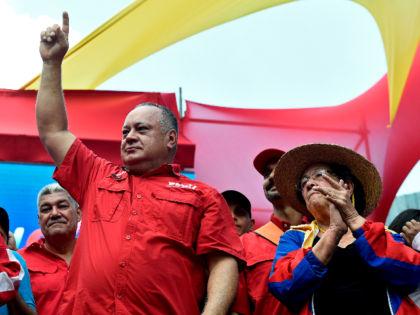 The president of the Venezuelan National Constituent Assembly Diosdado Cabello (L) gestures during a rally called by Venezuelan President Nicolas Maduro in Caracas on April 6, 2019. - Venezuela's opposition leader Juan Guaido urged his supporters to demonstrate in the streets Saturday to maintain pressure on his rival President Nicolas …