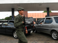 Cars queue to refill their gasoline tanks at a gas station in the town of Acarigua, in the Venezuelan state of Portuguesa, on May 25, 2019. (Photo by Marvin RECINOS / AFP) (Photo credit should read MARVIN RECINOS/AFP/Getty Images)