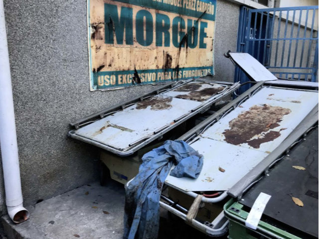 View of stretchers outside the morgue of Dr. Miguel Perez Carreno Hospital, in the west of