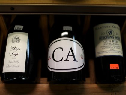 LOS ANGELES, CA - FEBRUARY 14: Bottles of California wines are displayed on a shelf at John and Pete's Fine Wine and Spirits on February 14, 2017 in Los Angeles, California. Exports of U.S. wines, specifically from California, increased by one percent to a record high of $1.62 billion in …