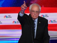 Democratic presidential hopeful US Senator for Vermont Bernie Sanders (R) and former US Vice President Joseph R. Biden Jr. participate in the second Democratic primary debate of the 2020 presidential campaign season hosted by NBC News at the Adrienne Arsht Center for the Performing Arts in Miami, Florida, June 27, …