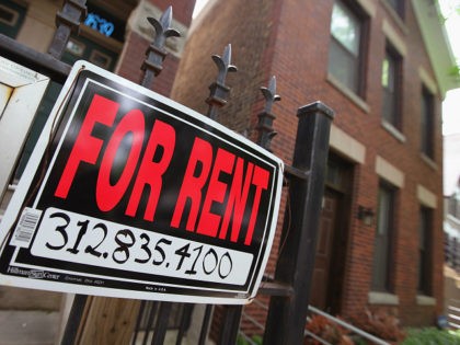CHICAGO, IL - MAY 31: A "For Rent" sign stands in front of a house on May 31, 2011 in Chicago, Illinois. According to the Standard & Poor's Case-Shiller Home Price Index home prices fell in March in 18 of the 20 metropolitan areas monitored by the index, reaching their …
