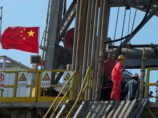 Employees work in an oil rig operated by Cuba and China, on April 18, 2011, in eastern Hav