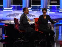 Moderators Chuck Todd (L) and Rachel Maddow speak to audience during a technical problem as they host the first night of the Democratic presidential primary debate hosted by NBC News at the Adrienne Arsht Center for the Performing Arts in Miami, Florida, on June 26, 2019. (Photo by JIM WATSON …