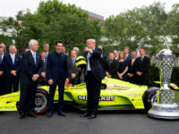 US President Donald Trump greets members of Team Penske, as he recieves a helmet from driver Simon Pagenaud (C) the winner of the 103rd Indianapolis 500 and Roger Penske (L), at the White House in Washington, DC, on June 10, 2019. (Photo by Jim WATSON / AFP) (Photo credit should …