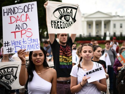 Immigrants and supporters demonstrate during a rally in support of the Deferred Action for Childhood Arrivals (DACA) in front of the White House on September 5, 2017 in Washington DC. US President Donald Trump has rescinded the program, ending amnesty for 800,000 young immigrants brought to the US illegally as …