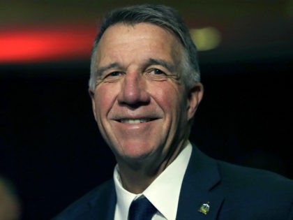 FILE - In this Nov. 6, 2018, file photo, Republican Vermont Gov. Phil Scott smiles during an election night rally party in Burlington, Vt. After Scott is sworn in Thursday, Jan. 10, 2019, he is expected to give an inaugural address that will outline his plans for the upcoming session …