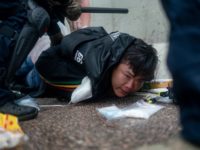 HONG KONG, HONG KONG - JUNE 12: A protester is arrested by police officer during a protest on June 12, 2019 in Hong Kong China. Large crowds of protesters gathered in central Hong Kong as the city braced for another mass rally in a show of strength against the government …