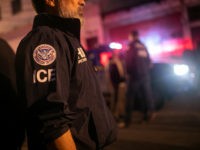 GUATEMALA CITY, GUATEMALA - MAY 29: An ICE agent with U.S. Homeland Security Investigations (HSI), watches as Guatemalan police investigate the scene after detaining a suspected human trafficker on May 29, 2019 in Guatemala City. Homeland Security agents accompanied Guatemalan police on an early morning raid, the first since Acting …