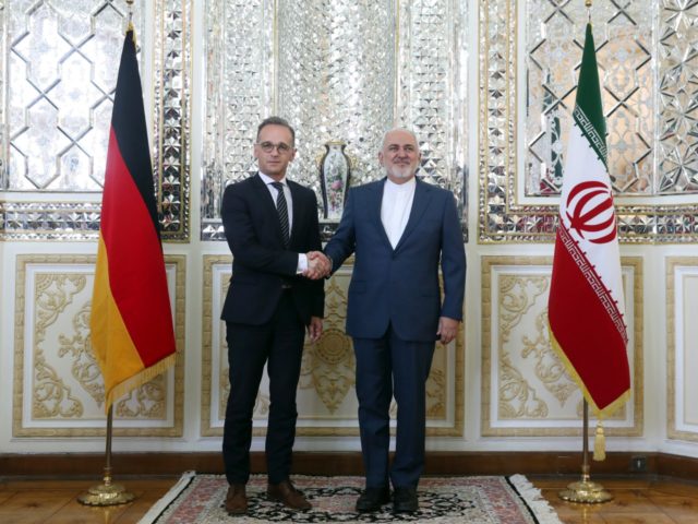 Iranian Foreign Minister Mohammad Javad Zarif, right, and his German counterpart Heiko Maa