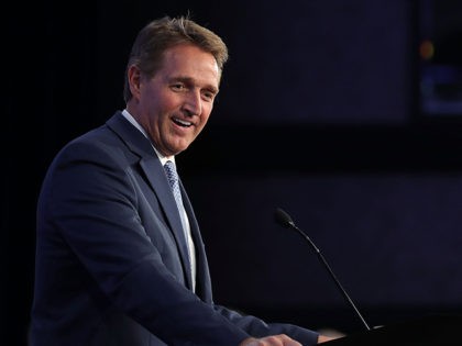 WASHINGTON, DC - JANUARY 25: Sen. Jeff Flake (R-AZ) delivers remarks during the U.S. Conference of Mayors 86th annual Winter Meeting at the Capitol Hilton January 25, 2018 in Washington, DC. Flake spoke during the conference's Childhood Obesity Prevention Awards Luncheon which was sponsored by the American Beverage Association, whose …