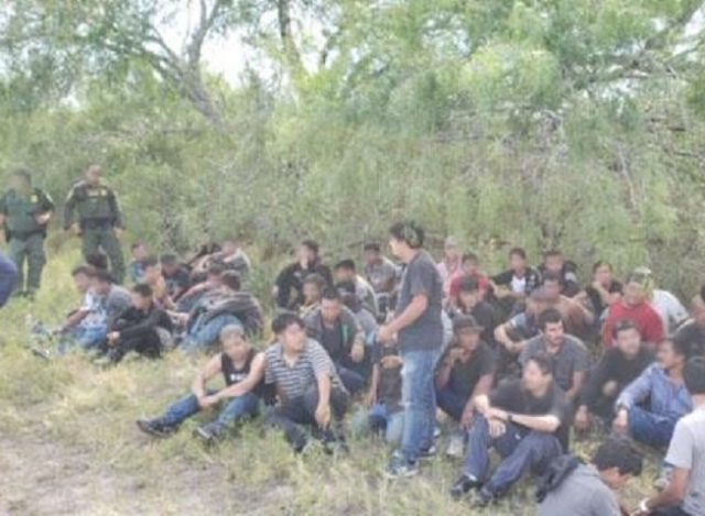 Laredo Sector Border Patrol agents apprehend a large group of mostly Central American migr
