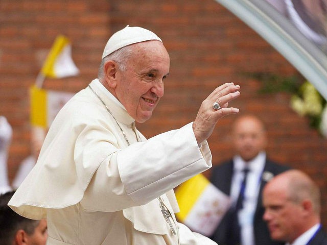 Pope Francis waves as he arrives in the Popemobile at the Saint Joseph Cathedral in Bucharest on May 31, 2019. - Pope Francis came to Romania with a message of integration not just for its faith communities but for a post-election European Union, following nationalist gains. During the three-day trip …