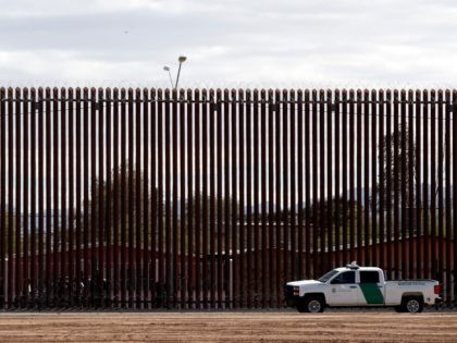 In this April 5, 2019, photo, a U.S. Customs and Border Protection vehicle sits near the a