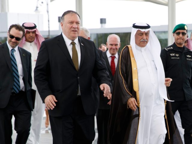 U.S. Secretary of State Mike Pompeo, left, walks with Saudi Foreign Minister Ibrahim Abdul