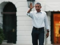 WASHINGTON, DC - JUNE 30: (AFP OUT) U.S. President Barack Obama and first lady Michelle Obama walk out of the White House while hosting Girl Scouts from across the country for a campout on the South Lawn June 30, 2015 in Washington, DC. The first family hosted the event as …