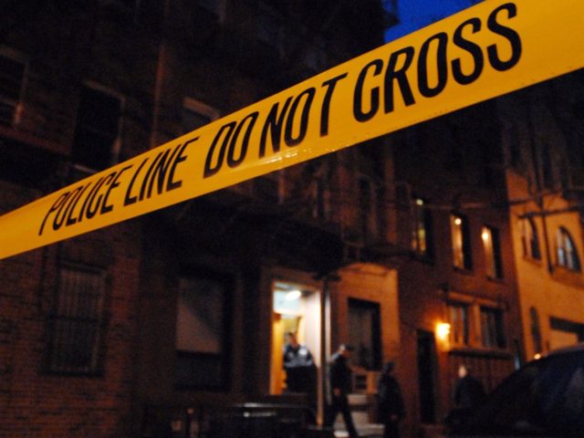 bronx NEW YORK - FEBRUARY 22: Police tape hangs outside the apartment building at 31 Downi