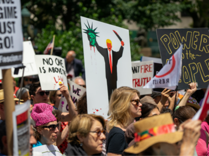 NEW YORK, NY - JUNE 15: Protestors attend a demonstration calling for the impeachment of U.S. President Donald Trump on June 15, 2019 in New York City. Major cities across the country are expected to hold "#ImpeachTrump Day of Action" protests on Saturday to demand that Congress begin impeachment proceedings …