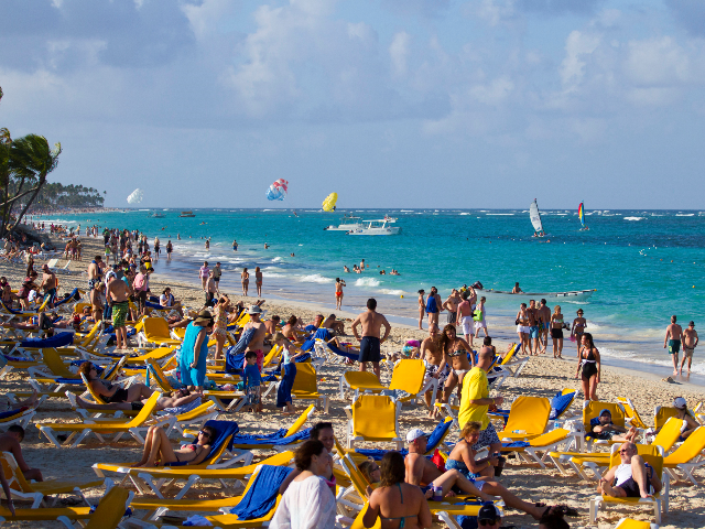 Tourists rest at Bavaro beach, in Punta Cana, Dominican Republic, on January 16, 2012. Tou