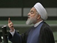 President Hassan Rouhani speaks at the Iranian Parliament in the capital Tehran, on August 28, 2018. - It was the first time Rouhani had been summoned by parliament in his five years in power, with MPs demanding answers on unemployment, rising prices and the collapsing value of the rial, which …