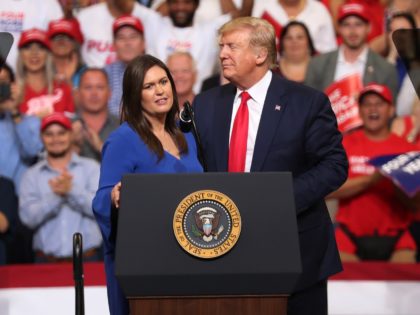 ORLANDO, FLORIDA - JUNE 18: U.S. President Donald Trump stands with Sarah Huckabee Sanders, who announced that she is stepping down as the White House press secretary, during his rally where he announced his candidacy for a second presidential term at the Amway Center on June 18, 2019 in Orlando, …