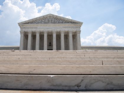 Members of the press camp out in front of the US Supreme Court in Washington, DC, on June