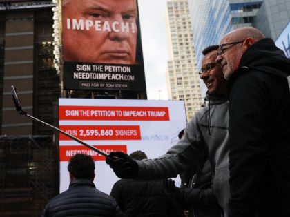 NEW YORK, NY - NOVEMBER 20: A billboard in Times Square, funded by Philanthropist Tom Stey