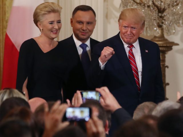 WASHINGTON, DC - JUNE 12: U.S. President Donald Trump (R) participates in a Polish-American reception with the President of Poland Andrzej Duda (C) and his wife Agata Kornhauser-Duda (L) in the East Room at the White House on June 12, 2019 in Washington, DC. (Photo by Mark Wilson/Getty Images)