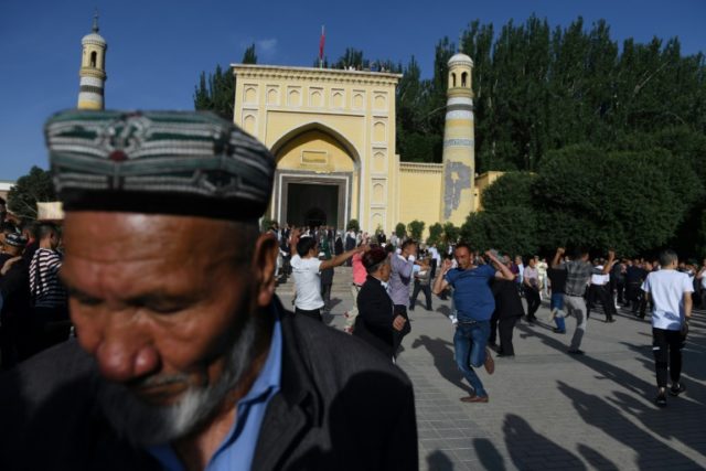Wrecked mosques, police watch: A tense Ramadan in Xinjiang