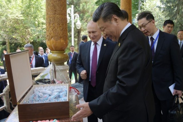 'Good gifts': Putin presents Xi with birthday ice cream