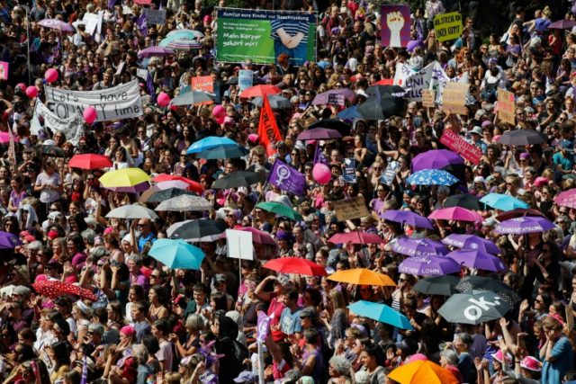 Sea of purple: Swiss women strike for equal pay