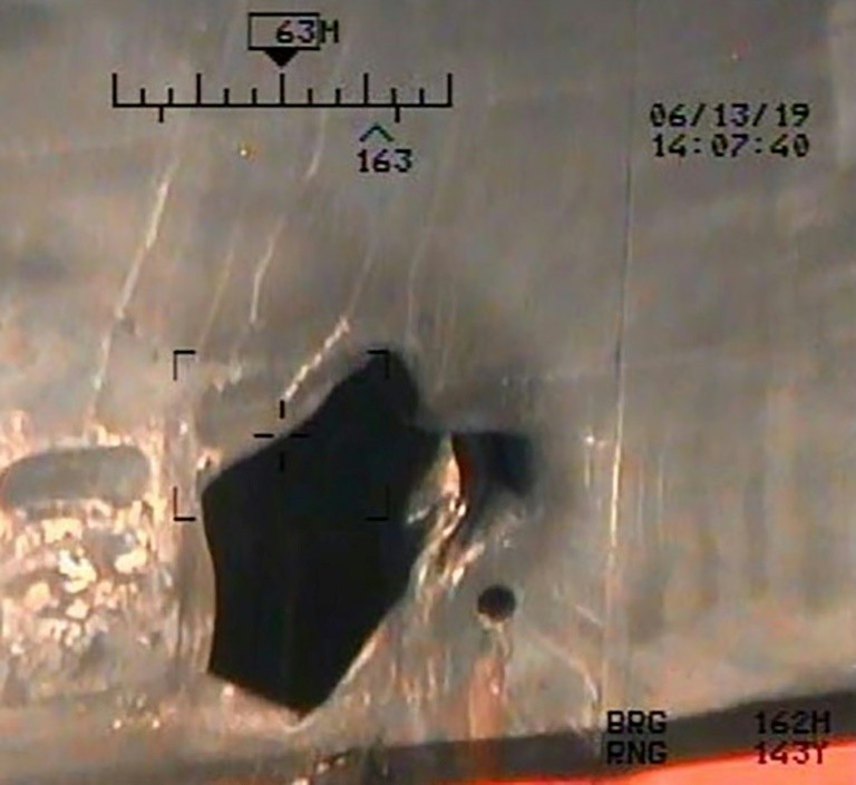 U.S. Department of Defense has released further images of hull damage to an oil tanker damaged last week in the Gulf of Oman (AFP).