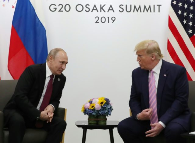 US president Donald Trump and Russian president Vladimir Putin met for face-to-face talks in Osaka on Friday With a smile, Trump tells Putin 'don't meddle in the election'