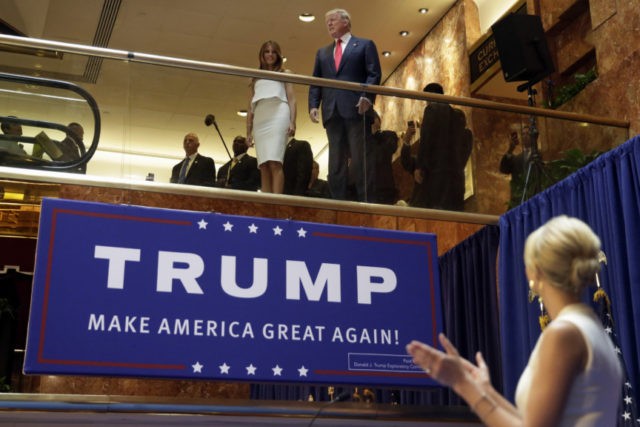 Trump The Launch In this Sunday, June 16, 2015, file photo, Donald Trump, accompanied by his wife Melania Trump, is applauded by his daughter Ivanka Trump, right as he's introduced before his announcement that he will run for president in the lobby of Trump Tower in New York. It was the escalator ride that would change history. Four years ago on Sunday, Donald Trump descended through the marble and brass atrium of Trump Tower to announce his candidacy for president. It was the first step on a journey few believed would take him all the way to the White House. (AP Photo/Richard Drew, File) The Associated Press