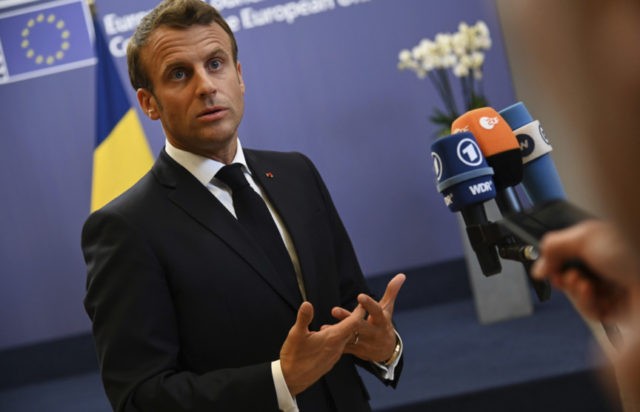 Belgium Europe Top Jobs French President Emmanuel Macron speaks with the media during an EU summit at the Europa building in Brussels, Friday, June 21, 2019. European Union leaders have failed to back a plan to make the bloc's economy carbon neutral by 2050 in spite of promises to fight harder against climate change. (AP Photo/Riccardo Pareggiani) The Associated Press