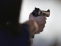 ATHENS - AUGUST 18: Michiko Fukushima of Japan lines up a shot during the women's 25 metre pistol qualifying event on August 18, 2004 during the Athens 2004 Summer Olympic Games at the Markopoulo Olympic Shooting Centre in Athens, Greece. (Photo by Robert Laberge/Getty Images)