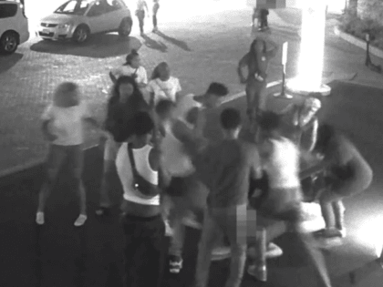 WASHINGTON — Detectives from the Metropolitan Police Department's Third District in Washington released surveillance footage outside of the Hilton Hotel in Dupont Circle that shows a large group of people attacking and beating two men from Hampton Roads.