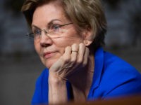 US Senator Elizabeth Warren, Democrat of Massachusetts, questions US Secretary of the Army Mark Esper, nominee to be Secretary of Defense, during a Senate Armed Services Committee confirmation hearing on Capitol Hill in Washington, DC, July 16, 2019. (Photo by SAUL LOEB / AFP) (Photo credit should read SAUL LOEB/AFP/Getty …