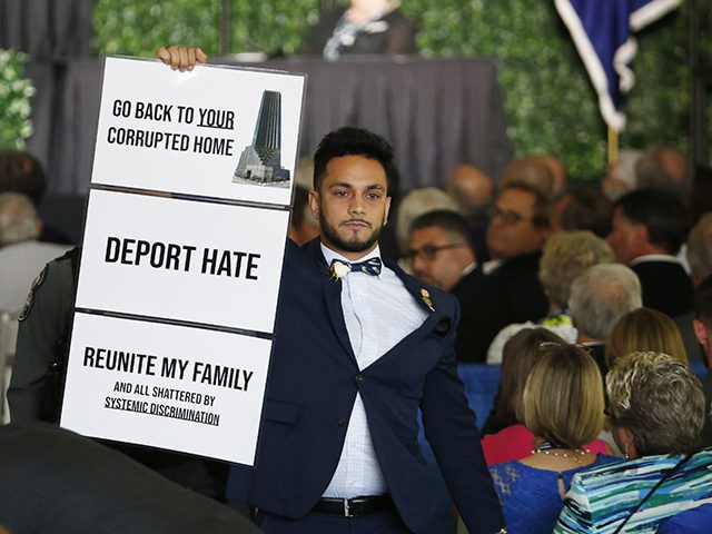 ADDS NAME OF SAMIRAH - Virginia Delegate Ibraheem S. Samirah, D-Fairfax, is escorted out o