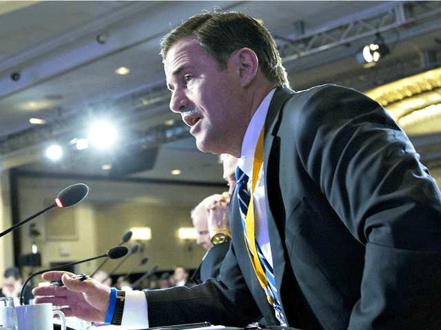 Arizona Gov. Doug Ducey speaks during a panel at the National Governors Association 2018 w