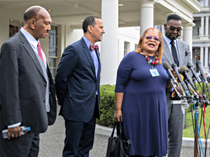 Alveda King, second from right, niece of civil rights leader Martin Luther King Jr. together with other religious leaders, from left, Rev. Bill Owens, Rev. Dean Nelson and Bishop Harry Jackson, speaks to reporters following a meeting with President Donald Trump at the White House in Washington, Monday, July 29, …
