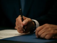 New York Governor Andrew Cuomo signs the Climate Leadership and Community Protection Act at Fordham Law School in the borough of Manhattan on July 18, 2019 in New York City. Framed by Governor Cuomo as a statewide Green New Deal, the act commits New York state to expand offshore wind …