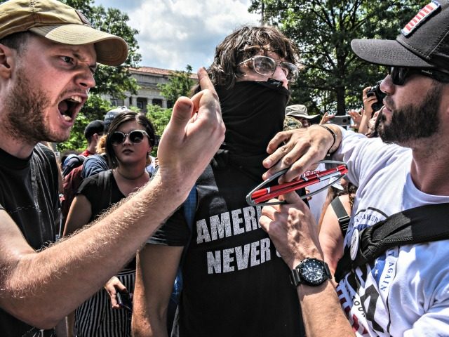 WASHINGTON, DC - JULY 06: People of the "left-wing" side yell at a Trump supporter during a "Demand Free Speech" rally on Freedom Plaza on July 6, 2019 in Washington, DC. The demonstrators are calling for an end of censorship by social media companies. (Photo by Stephanie Keith/Getty Images)