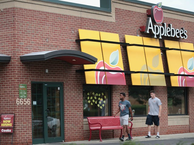 An Applebee's restaurant serves customers on August 10, 2017 in Chicago, Illinois. DineEqu