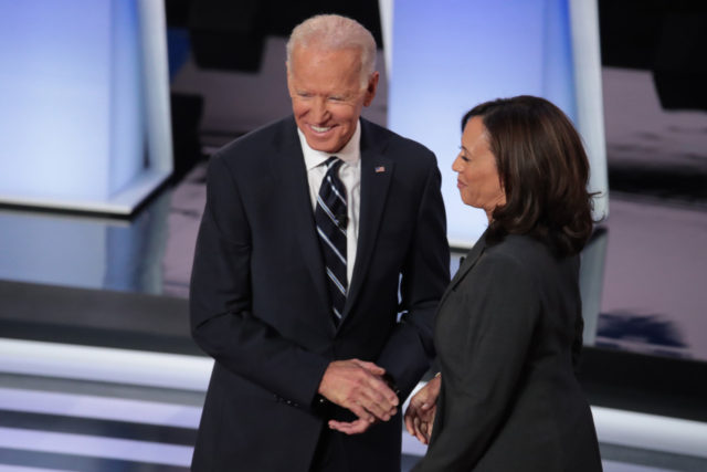 DETROIT, MICHIGAN - JULY 31: Democratic presidential candidates former Vice President Joe Biden and Sen. Kamala Harris (D-CA) greet each other at the Democratic Presidential Debate at the Fox Theatre July 31, 2019 in Detroit, Michigan. 20 Democratic presidential candidates were split into two groups of 10 to take part …