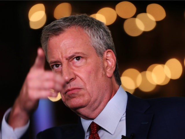 Democratic presidential candidate New York City Mayor Bill De Blasio prepares for a television interview in the spin room before the second night of the first Democratic presidential debate June 27, 2019 in Miami, Florida. A field of 20 Democratic presidential candidates was split into two groups of 10 for …