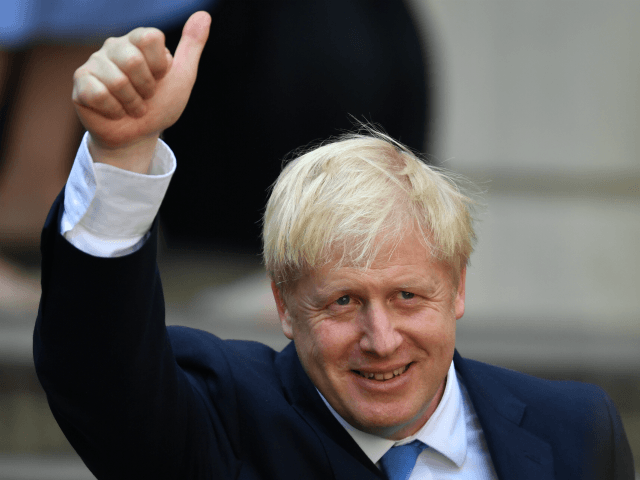 LONDON, ENGLAND - JULY 23: Newly elected leader of the Conservative party Boris Johnson gestures at Conservative party HQ in Westminster on July 23, 2019 in London, England. After a month of hustings, campaigning and televised debates the members of the UK's Conservative and Unionist Party have voted for Boris …