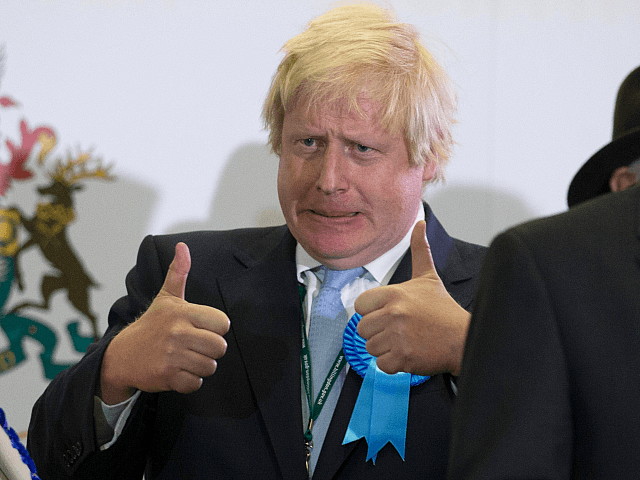 UXBRIDGE, ENGLAND - MAY 08: (Alternate crop of #472458768) Boris Johnson, Conservative candidate for Uxbridge celebrates on stage following his win as he attends the count at Brunel University London on May 8, 2015 in Uxbridge, England. The United Kingdom has gone to the polls to vote for a new …
